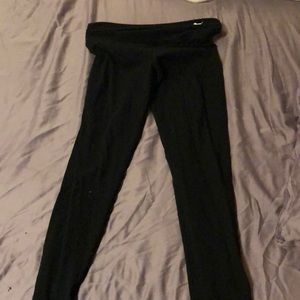 Black vs pink fold over yoga legging